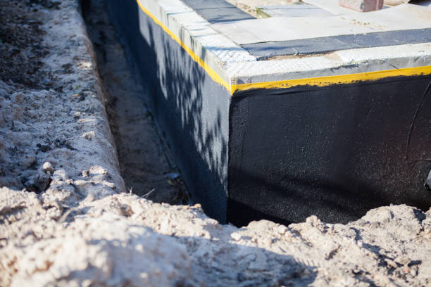 Professional Waterproofing technician working in Kewanna, IN